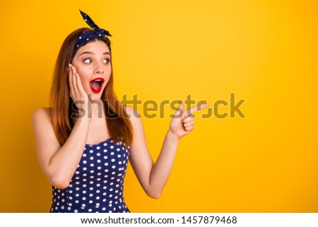 Photo of beautiful foxy lady indicate black friday unbelievable low prices wear dotted dress headband isolated bright yellow background
