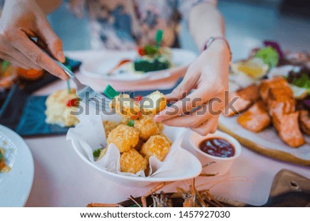 Picture of deep fried cheese balls or croquettes on dinner table