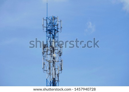 Telecommunication tower of 4G and 5G cellular. Base Station or Base Transceiver Station. Wireless Communication Antenna Transmitter. Telecommunication tower with antennas against blue sky background.