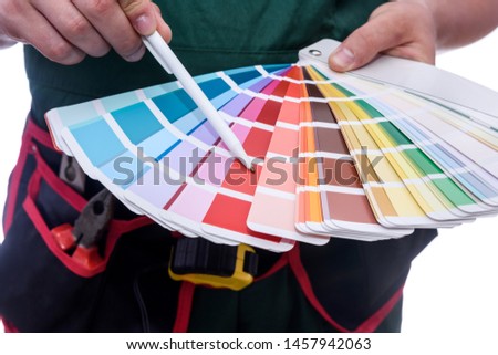 Colour swatch in male hands close up