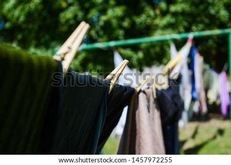 Laundry dries on the street