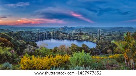 Panoramic crater lake view from the top of the world in the crater lake region in Uganda near Kibale Royalty-Free Stock Photo #1457977652