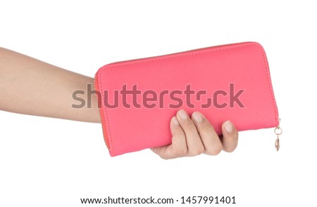 Hand holding Pink Leather Large Zipped Wallet long isolated on white background