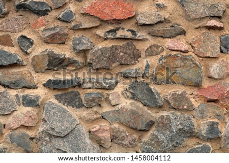 Abstract old wall of stones. Masonry texture or old stone background.