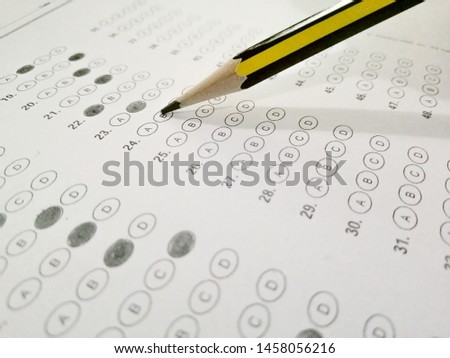 Pencil point on to bubble answer sheet.
