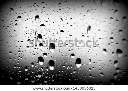 Raindrops on the window. Close-up of water on the glass. After the rain.