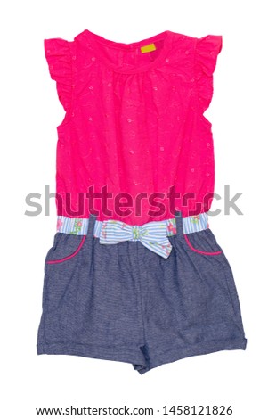 Jumpsuit isolated. Closeup of a stylish sleeveles pink blue denim jumpsuit with a clorful ribbon bow isolated on a white background. Childs fashion.