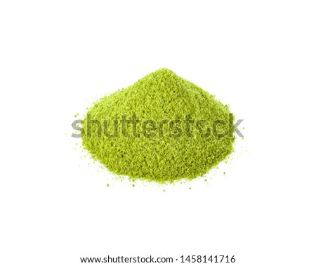 Powdered matcha green tea on white background