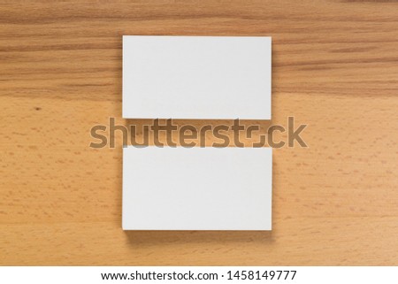 Mockup of business cards at wooden background