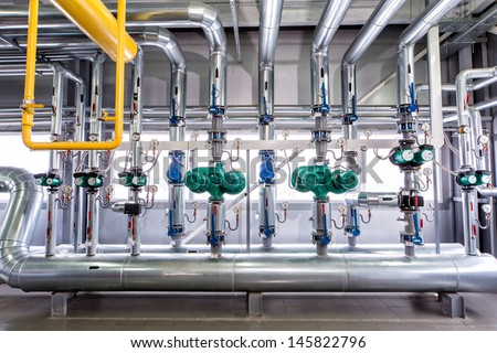 interior of an industrial boiler, the piping, pumps and motors Royalty-Free Stock Photo #145822796