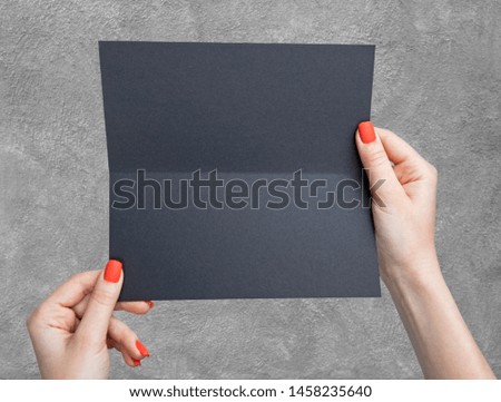 A woman holding black booklet. Identity template
