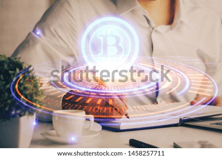 Man's hands working with notes background. Cryptocurrency and finance concept.
