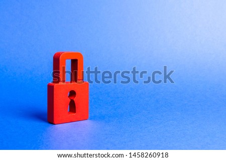 A red padlock. information safty. preservation of secrets, information and values. Protection and insurance. Hacking attack. Safety of personal data, privacy of users. NSFW. Virus, antivirus Royalty-Free Stock Photo #1458260918