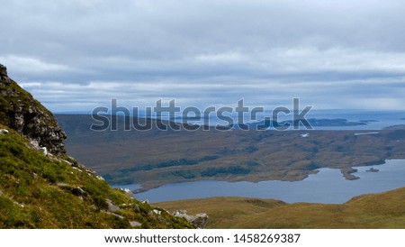 hiking trip around the Cul Mor in Lairg, Scotland - through meadows with mountain view