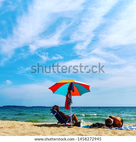 a couple at the beach enjoying their holidays