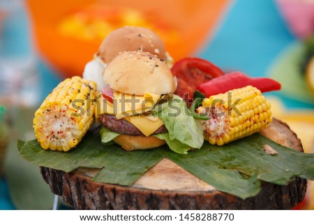grilled burgers and corn peppers
