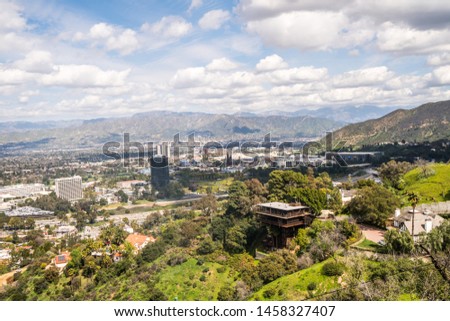 Beautiful scenic view of Los Angeles from Hollywood Hills and Sunset Blvd, before sunset