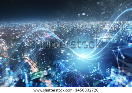 Fast connection in the city at night. Abstract technology background.