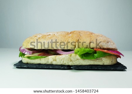 A picture of 6 inch chicken and beef bacon sandwich for the best breakfast in the morning.