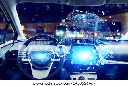 Interior of autonomous car. Driverless vehicle. Self driving. UGV. Advanced driver assistant system. Royalty-Free Stock Photo #1458526469