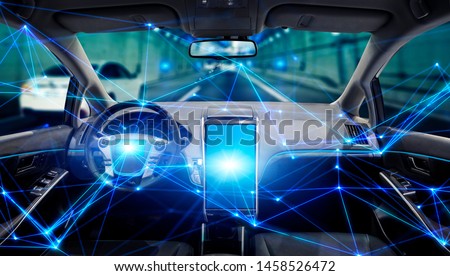 Interior of autonomous car. Driverless vehicle. Self driving. UGV. Advanced driver assistant system. Royalty-Free Stock Photo #1458526472