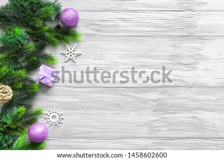 Beautiful Christmas composition on light wooden background
