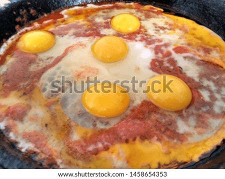 Picture of a Moroccan omelet with tomatoes