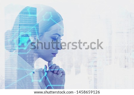 Pensive young businesswoman thinking over cityscape background with double exposure of internet icons. Concept of hi tech in business. Toned image