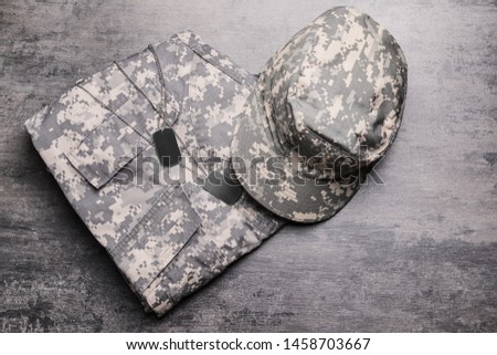 Military uniform on grey background