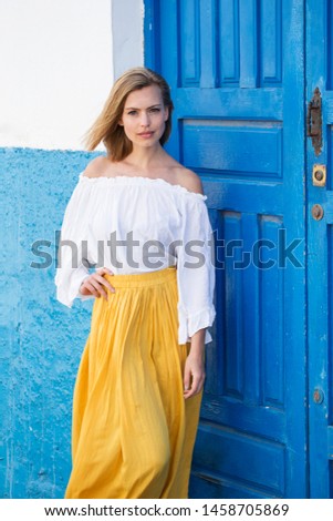 Gorgeous model in white and yellow fashion, portrait