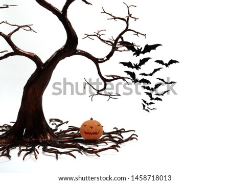 Halloween background. Space for text.Silhouette dead tree on dark dramatic sky background for scary or death. Hopeless, despair,sad and lament concept. Scary forest. Dramatic horror night on Halloween