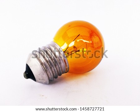 orange light bulb with a white background