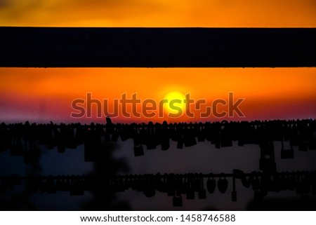 The abstract background of the sun, blurred patterns that fall on the decorations that hang on the side of the road or the viewpoint areas of various tourist attractions.