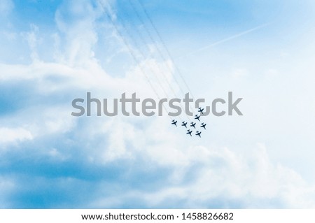 airshow on sky of army airport by jet planes and air planes
