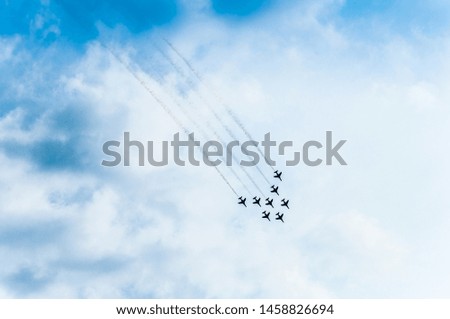 airshow on sky of army airport by jet planes and air planes