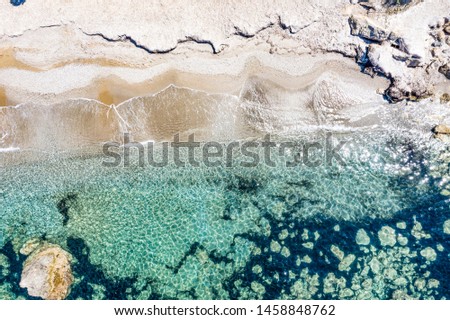 Aerial view of beautiful rocky coastline with turquoise sea water. 