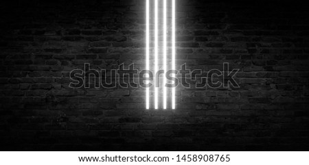 Background of an empty dark-black room. Empty  lights, smoke, glow, rays. Brick walls and neon light.