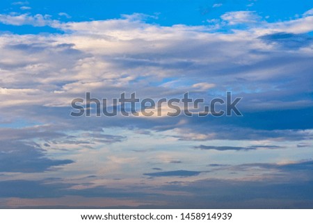 Landscape with clouds in the blue sky