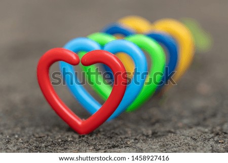 Five Color of Heart Sign Red Green Blue Yellow and Light Blue (Focus at Red Heart)