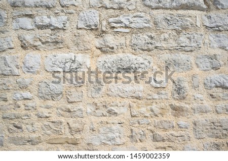 Old Grungy and Weathered Stone Wall Pattern Background
