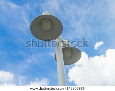 light pole with a blue sky background