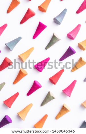 Colourful incense on white background