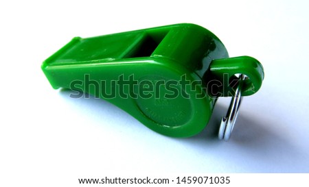 black plastic whistles are cheap, usually used by parking attendants, scouts, school children                       