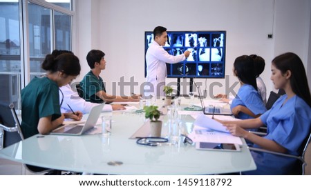 Medical concept. The male and female doctors are meeting together in the room.