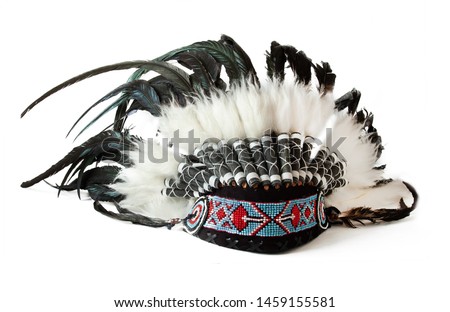 tradition Indian hat with pens isolated on white background
