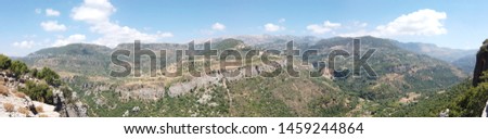 Panoramic Mountain and Valley Shot, with a clear sky and clouds.
Picture Taken in Khriebeh Al Shouf, Lebanon.