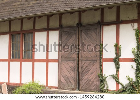 Half-timbered house with an iron door (Germany, Europe)