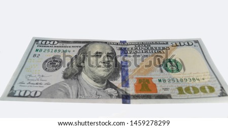 one hundred dollars on a white background