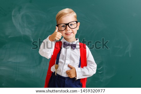 the child   schoolboy  boy student about school blackboard
