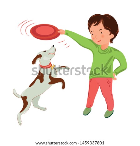 Cute young boy in green sweater play with domestic dog